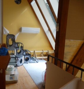 A room with boxes and stairs in it