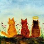 Three cats sitting on a hill with flowers